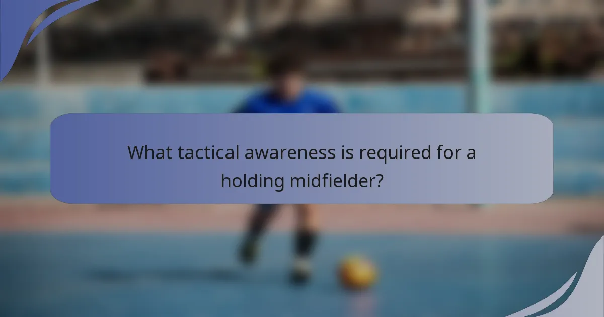 What tactical awareness is required for a holding midfielder?
